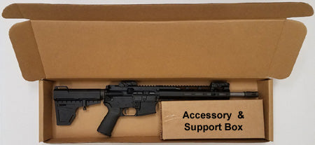 Cardboard box with a black rifle inside