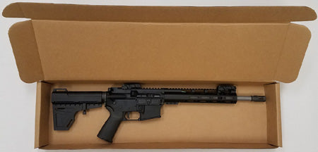 Black rifle in a cardboard box on a white background