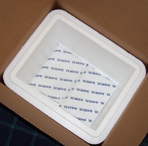 White insulated box inside a cardboard box