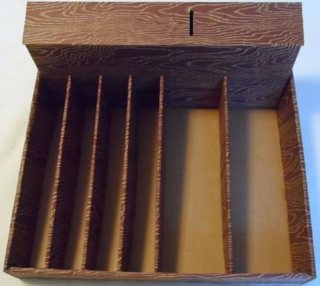 Wooden box with compartments on a white background