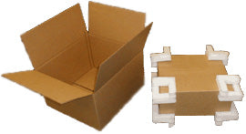 Cardboard box with white foam pieces on a plain background