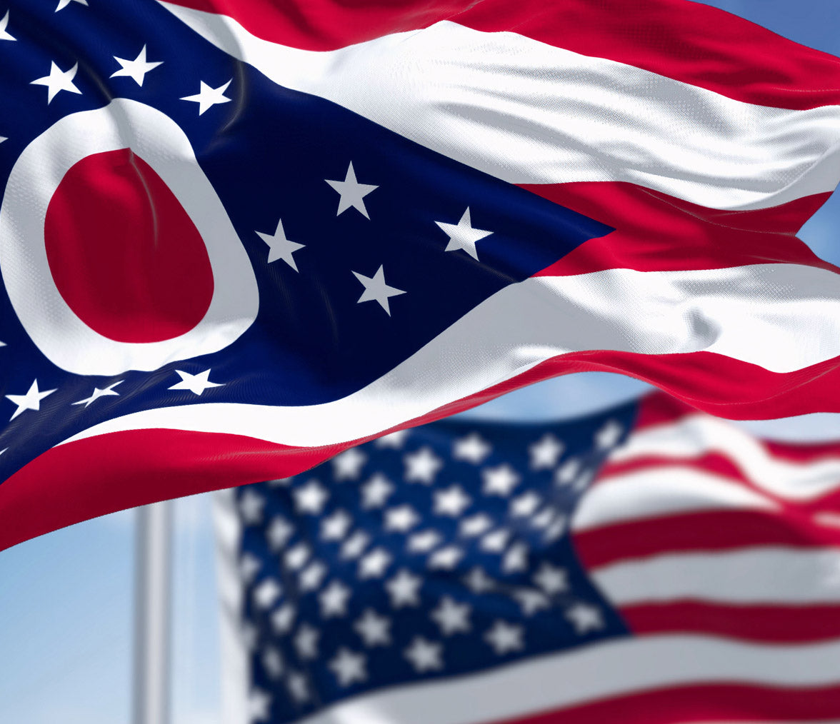Flag of Ohio with American flag in the background